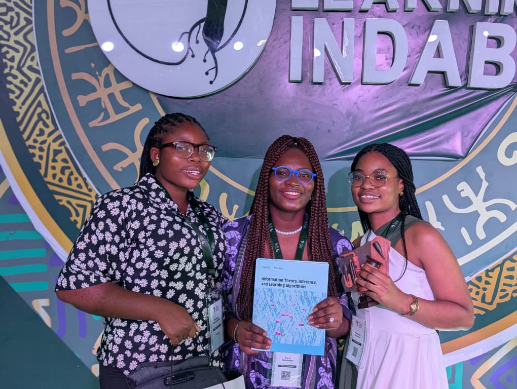 Flora Oladipupo with TAG Ecosystem teammates celebrating at Deep Learning Indaba 2026