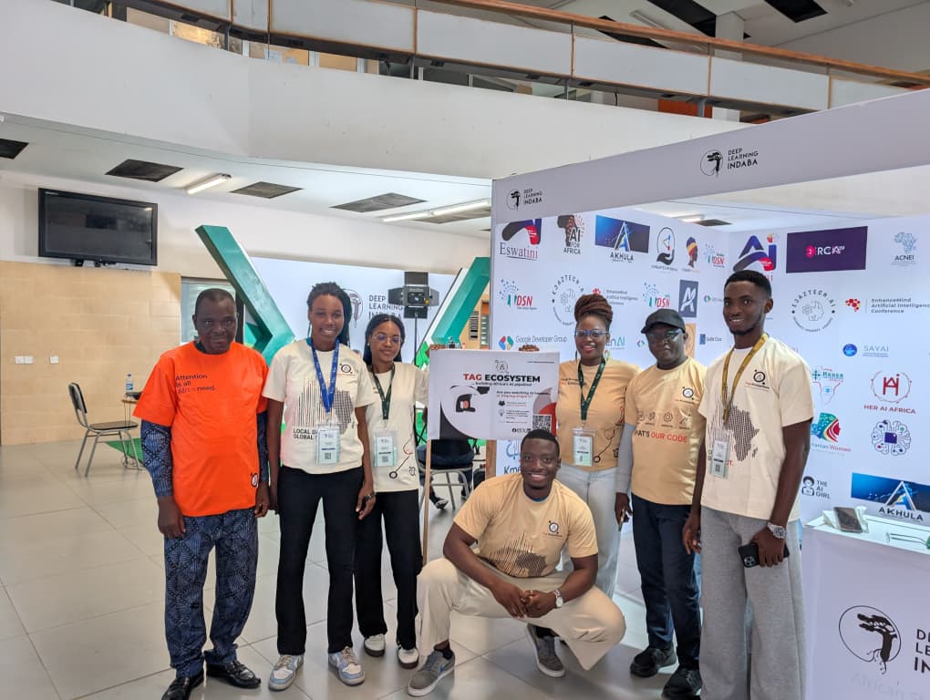 TAG Ecosystem community members at the team booth at Deep Learning Indaba Nigeria 2026